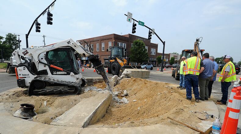 Fairborn crews work at the intersection of Central Ave. and Main St. Tuesday, June 6, 2023. MARSHALL GORBY\STAFF