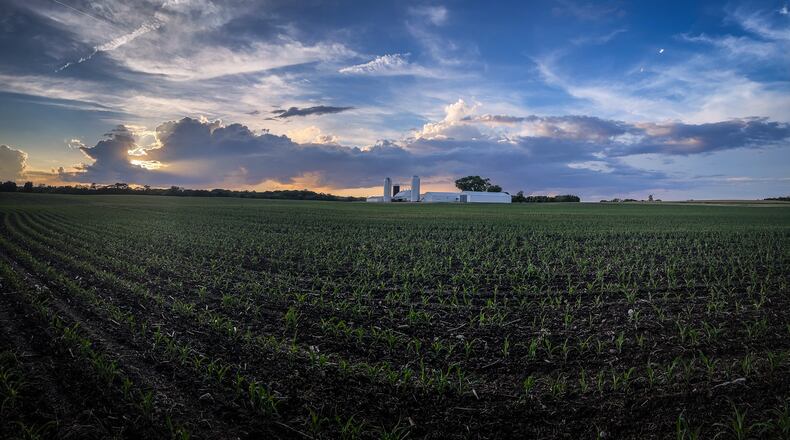 Storm clouds gather to the north of a Farmersville farm in Western Montgomery County. JIM NOELKER/STAFF