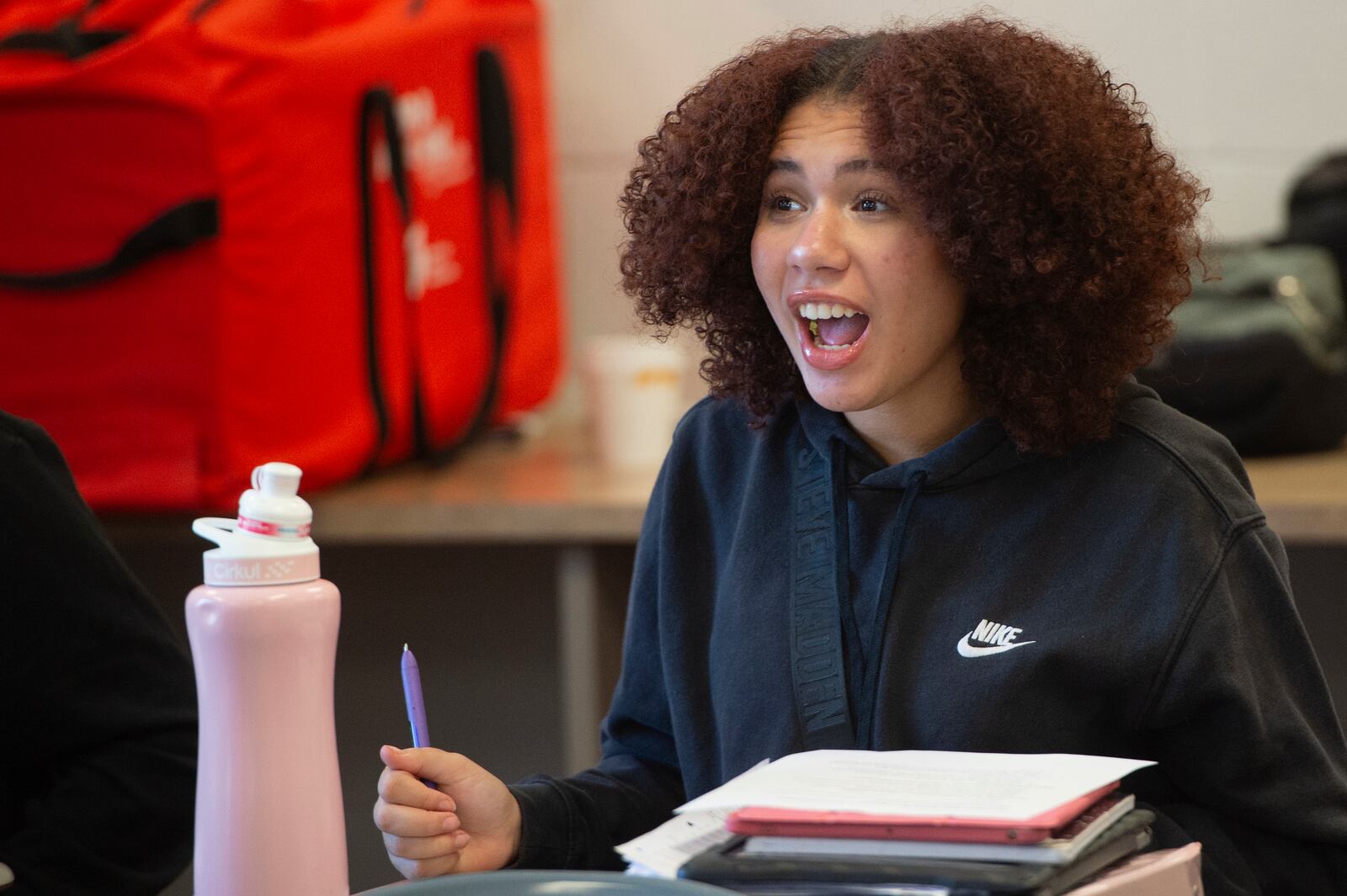 Mansfield Senior High School sophomore Regan Coley, 15, asks a question during her health class on sleep, in Mansfield, Ohio, Friday, Dec. 6, 2024. (AP Photo/Phil Long)