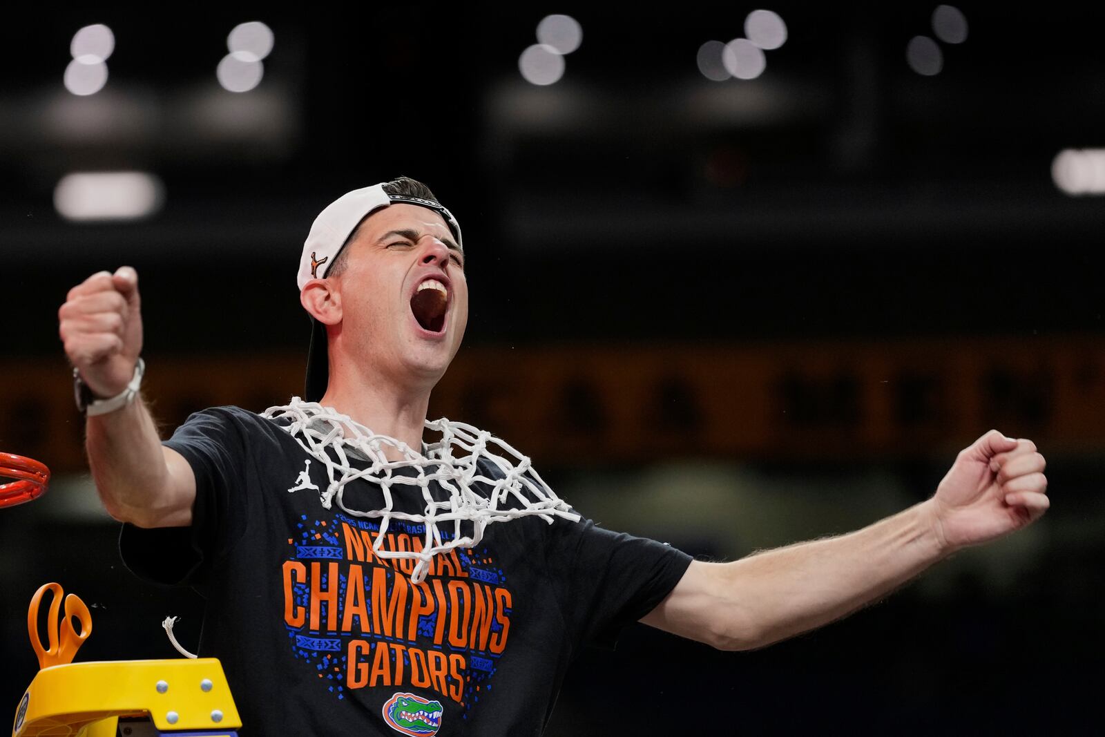 Florida head coach Todd Golden celebrates after Florida beat Houston in the national championship at the Final Four of the NCAA college basketball tournament, Monday, April 7, 2025, in San Antonio. (AP Photo/Eric Gay)