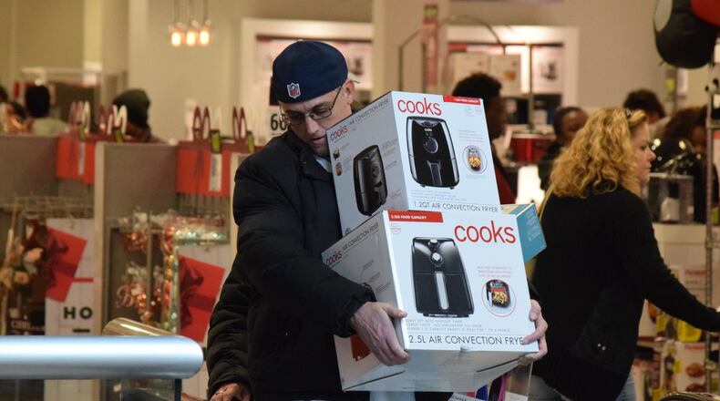 Managers estimate about 1,000 shoppers were at JCPenney when doors opened at 2 p.m. Thanksgiving day. STAFF PHOTO / HOLLY SHIVELY