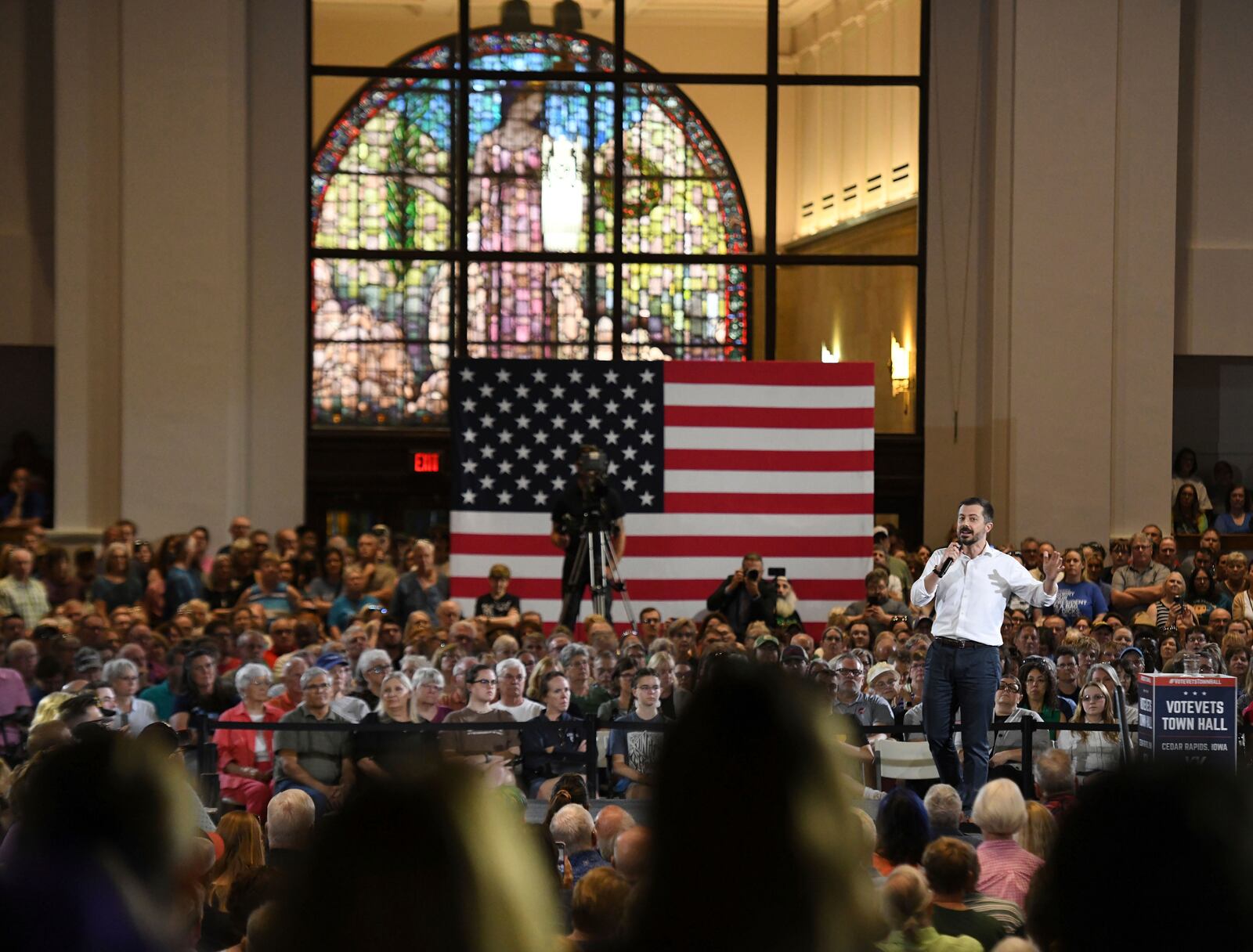 Pete Buttigieg, former transportation secretary, takes the stage during a VoteVets town hall, in Cedar Rapids, Iowa, Tuesday, May 13, 2025. (AP Photo/Cliff Jette)