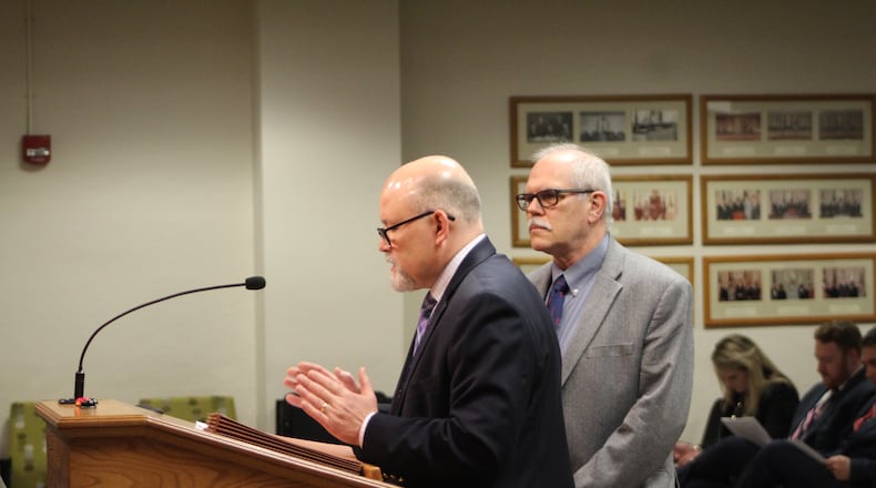 Public Health Commissioner Jeff Cooper and Dr. Michael Dohn pictured speaking last week about the outbreak. FILE