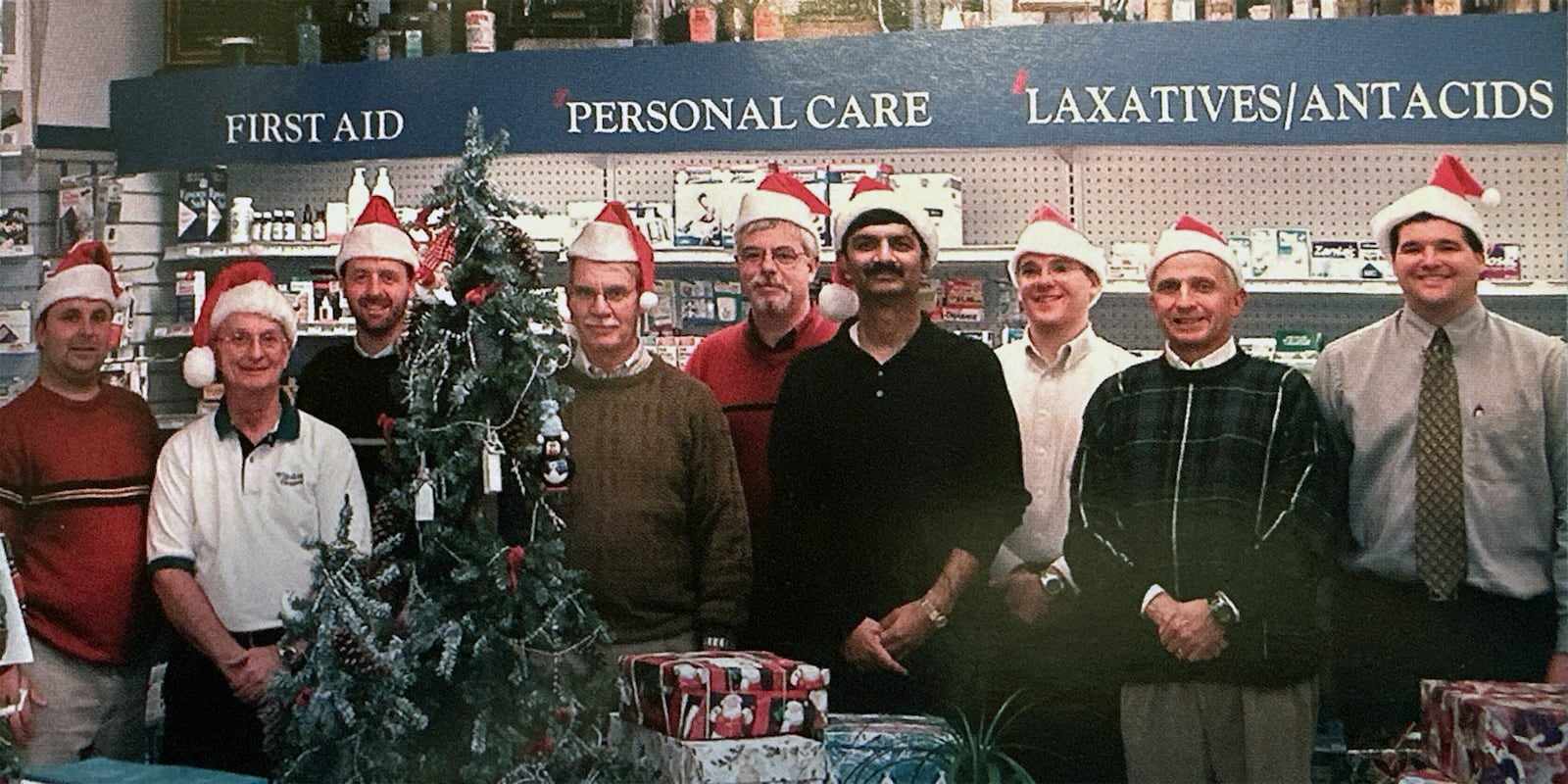 The Medicine Shoppe in Kettering staff posing for their Christmas card in 2006. Wurtzbacher worked with his father in the shoppe during high school and later after college. L-R
Doug Wurtzbacher, Roger Wurtzbacher, Bob Curlis, Phil Black, Harshad Patel, Dave Boyko, Mike Karn, Will Boyko CONTRIBUTED