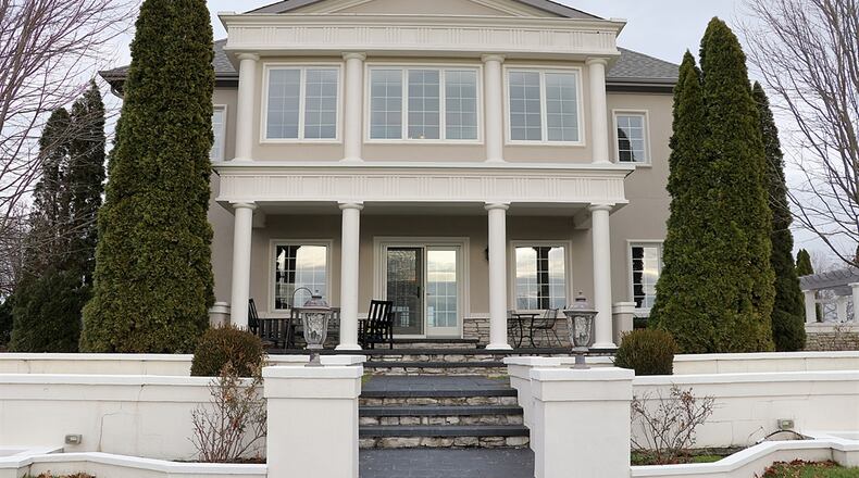 European-inspired, two-story residence has impeccable craftsmanship throughout, with an outdoor terraced garden complete with kitchen, fireplace, hot tub and natural privacy. Contributed photos by Kathy Tyler