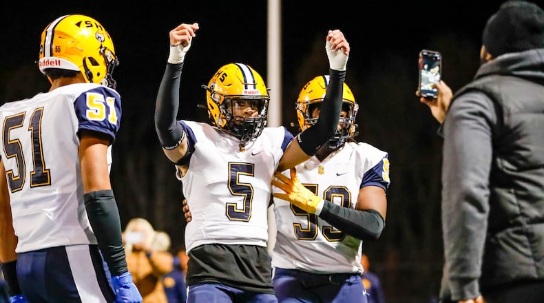 Springfield High School senior Aaron Scott celebrates after scoring a touchdown during their game against Olentangy on Friday night at Hilliard Darby High School. The Wildcats won 37-24. Michael Cooper/CONTRIBUTED