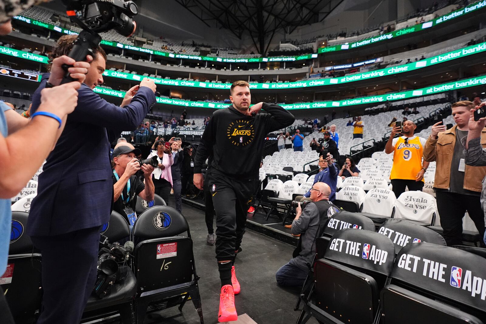 Los Angeles Lakers' Luka Doncic walks onto the court for warmups before an NBA basketball game against the Dallas Mavericks in Dallas, Wednesday, April 9, 2025. (AP Photo/LM Otero)