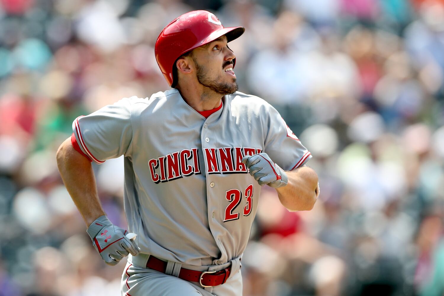 PHOTOS: Reds pile up 13 hits, beat the Rockies