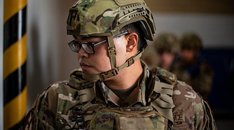 Airman Alex Orquiza, 71st Security Forces Squadron, wears the next generation of ballistic helmet during a door breaching exercise at Vance Air Force Base, Okla., Sept.15. The Air Force Security Forces Center is delivering the helmets to security forces units as part of its effort to standardize and modernize Defender equipment across the Air Force. U.S. AIR FORCE PHOTO/SENIOR AIRMAN TAYLOR CRUL