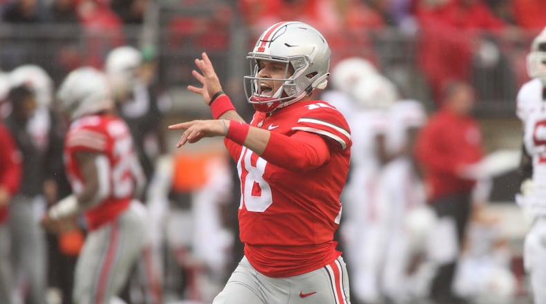 Ohio State’s Tate Martell celebrates after throwing a touchdown pass against Rutgers on Saturday, Sept. 8, 2018, in Columbus. David Jablonski/Staff