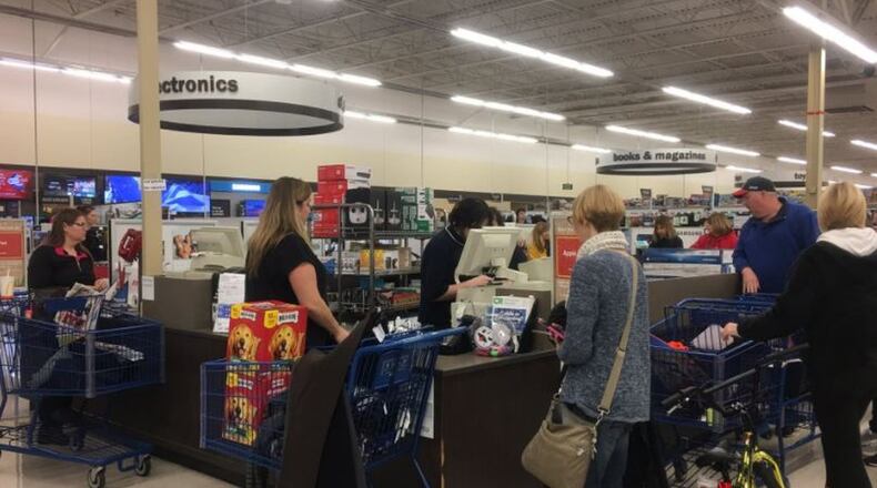 Shoppers wait in line at Meijer in Kettering on Thanksgiving. KARA DRISCOLL/STAFF