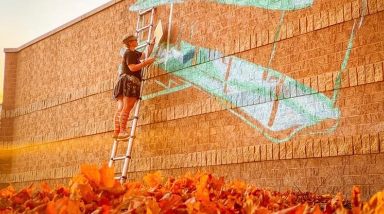 The Mall at Fairfield Commons has joined with Dayton artist Tiffany Clark for large-scale, aviation-themed public murals at the mall in Beavercreek. CONTRIBUTED