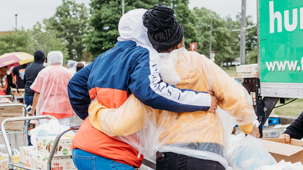 Clients receiving food at a mobile pantry. CONTRIBUTED