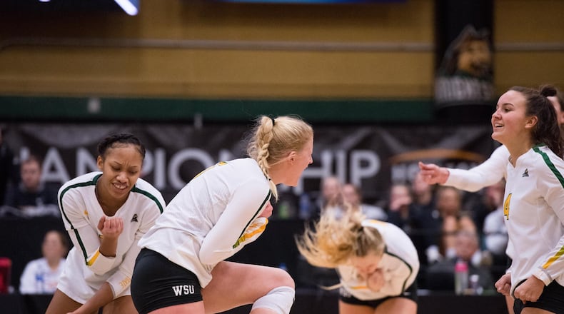 Wright State celebrates a point during a match against Northern Kentucky on Nov. 23, 2019. Joseph Craven/WSU Athletics
