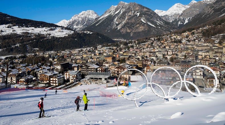 FILE - Olympic rings are displayed near a slope of the Stelvio Ski Center, venue for the alpine ski and ski mountaineering disciplines, at the 2026 Milan Cortina Winter Olympics, in Bormio, Italy, Jan. 16, 2025. (AP Photo/Luca Bruno, File)