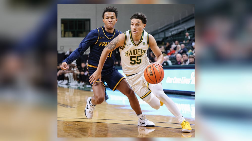 Wright State freshman guard Michael Cooper dribbles ahead of Franklin College's Logan Woods during a season opener against Franklin College on Monday, Nov. 3 at Ervin J. Nutter Center. BRYANT BILLING/STAFF