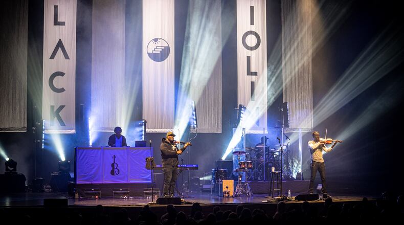 Violinist Kev Marcus (left) and violist Wil Baptiste are the classically trained duo known as Black Violin (seen here at the Schuster Center in fall 2019). Dayton Live is offering students and educators a virtual opportunity to see their latest concert.