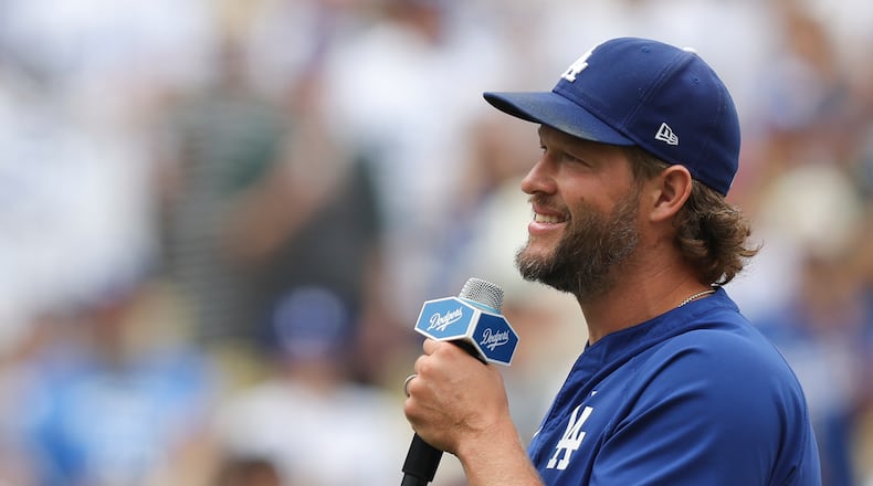 FILE - Los Angeles Dodgers pitcher Clayton Kershaw speaks to fans before a baseball game against the San Francisco Giants, Sept. 21, 2025, in Los Angeles. (AP Photo/Jessie Alcheh, File)