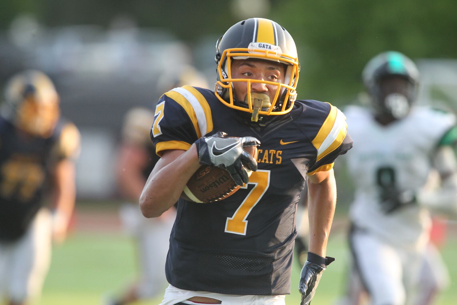 Springfield’s Danny Davis runs for a 61-yard touchdown against Dublin Coffman on Saturday, Aug. 27, 2016, at Edwards-Maurer Field in Springfield. David Jablonski/Staff