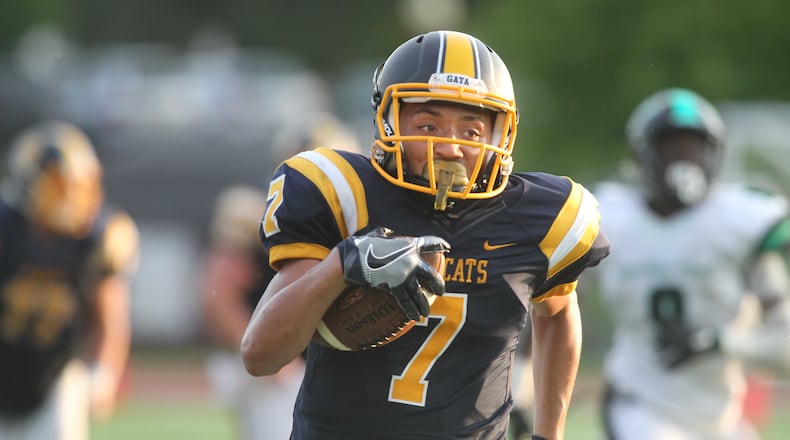 Springfield’s Danny Davis runs for a 61-yard touchdown against Dublin Coffman on Saturday, Aug. 27, 2016, at Edwards-Maurer Field in Springfield. David Jablonski/Staff