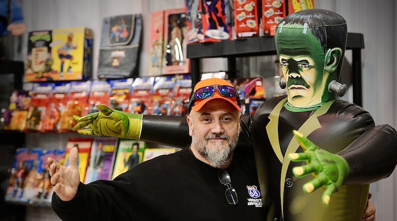 Rob Eldridge, owner of Route 68 Vintage Toys and Collectibles, sets up Thursday, March 28, 2024 for the Great Ohio Toy Show this Saturday, March 30, 2024 at the Greene County Expo center in Xenia. MARSHALL GORBY \STAFF