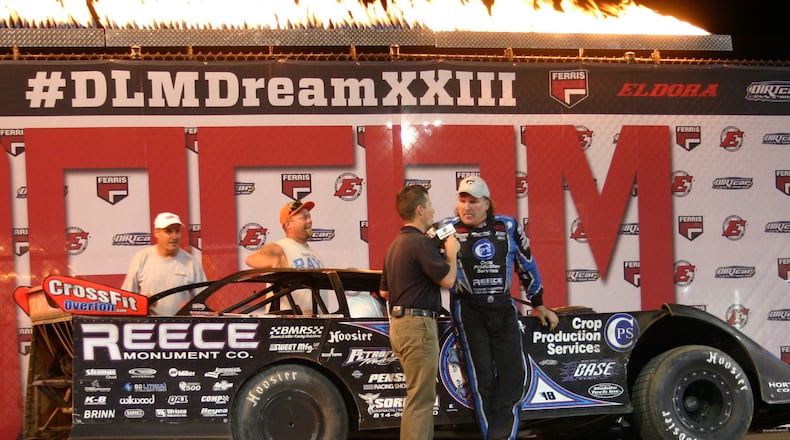 Tennessee’s Scott Bloomquist celebrates on Eldora Speedway’s victory lane stage after winning his record-extending seventh $100,000 Dirt Late Model Dream on Saturday. Contributed photo / Greg Billing
