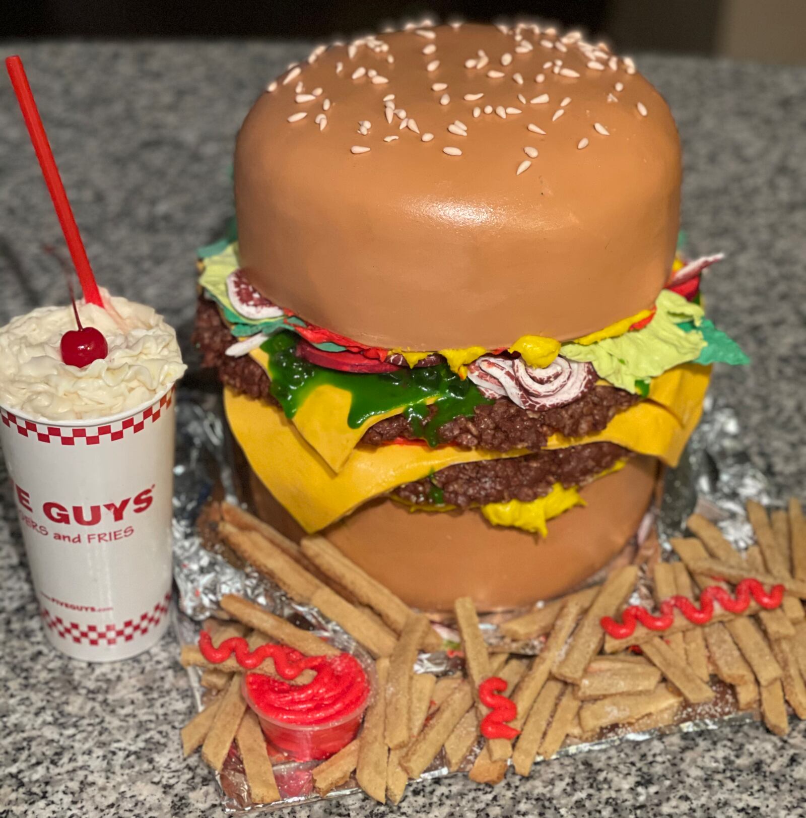 A custom cake from Straw-Babies by De’Jha.