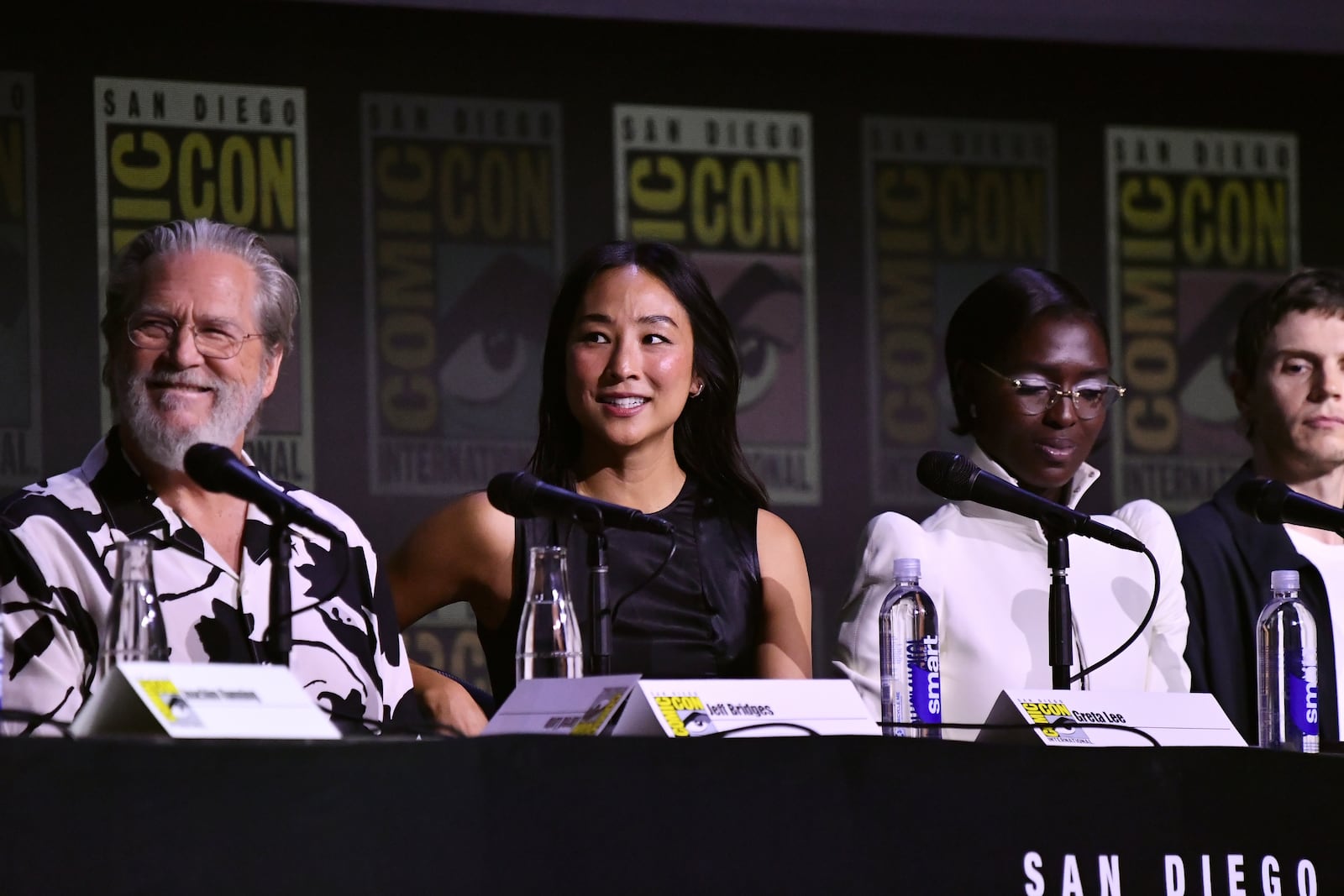 Jeff Bridges, from left, Greta Lee, Jodie Turner-Smith, and Evan Peters attends a panel for "Tron: Ares" during Comic-Con International on Friday, July 25, 2025, in San Diego. (Photo by Richard Shotwell/Invision/AP)