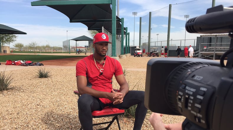 Reds pitcher Amir Garrett is interviewed Tuesday at the spring training complex in Goodyear, Arizona. MIKE HARTSOCK / WHIO TV