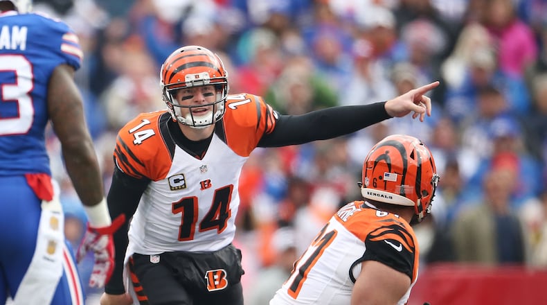 ORCHARD PARK, NY - OCTOBER 18: Andy Dalton #14 of the Cincinnati Bengals calls an audible against the Buffalo Bills defense during the first half at Ralph Wilson Stadium on October 18, 2015 in Orchard Park, New York. (Photo by Tom Szczerbowski/Getty Images)