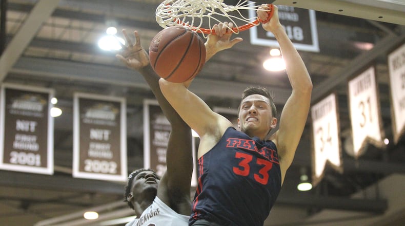 Dayton’s Ryan Mikesell dunks against St. Bonaventure on Saturday, Jan. 19, 2019, at the Reilly Center in Olean, N.Y. David Jablonski/Staff