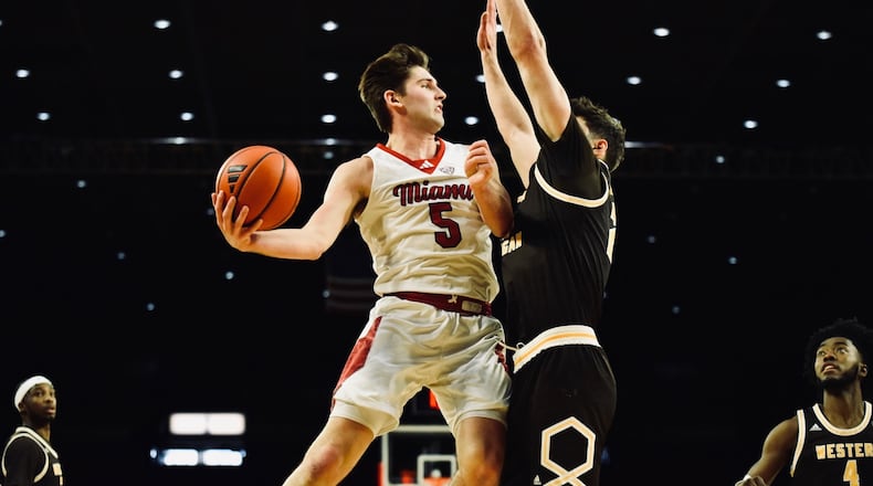 Miami's Peter Suder (5) goes up for a shot against Western Michigan on Saturday at Millett Hall. Jordan Phillips/CONTRIBUTED