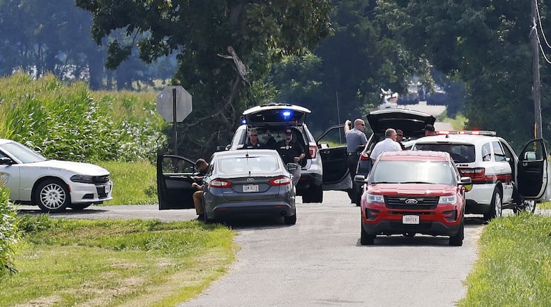 The area near Center and Smith roads was closed for hours during a standoff Aug. 11, 2022, in Clinton County after an armed man tried to breach the FBI's Cincinnati office and fled north on Interstate 75. NICK GRAHAM/STAFF