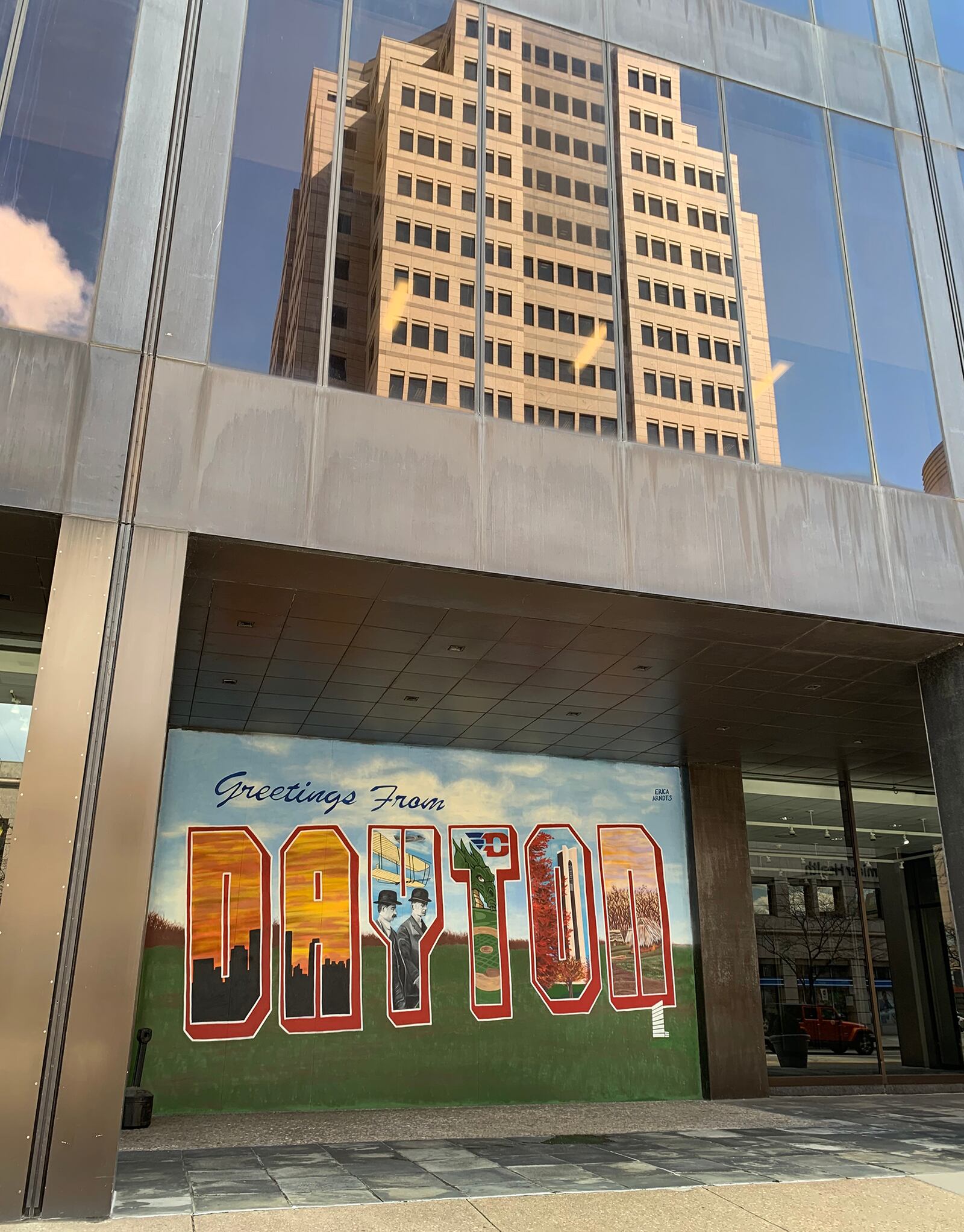 The latest downtown mural, created by artist Erica Arndts,l sends greetings to the community from Stratacache Tower.LISA POWELL / STAFF