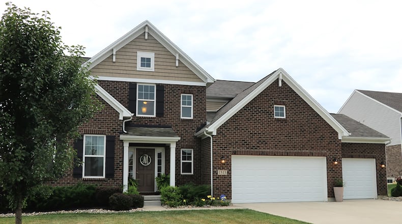 The 4-bedroom home about 3,280 sq. ft. of living space plus a finished recreation room and half bathroom within the full basement. The house sits on a half-acre lot with a 3-car garage. CONTRIBUTED PHOTO BY KATHY TYLER