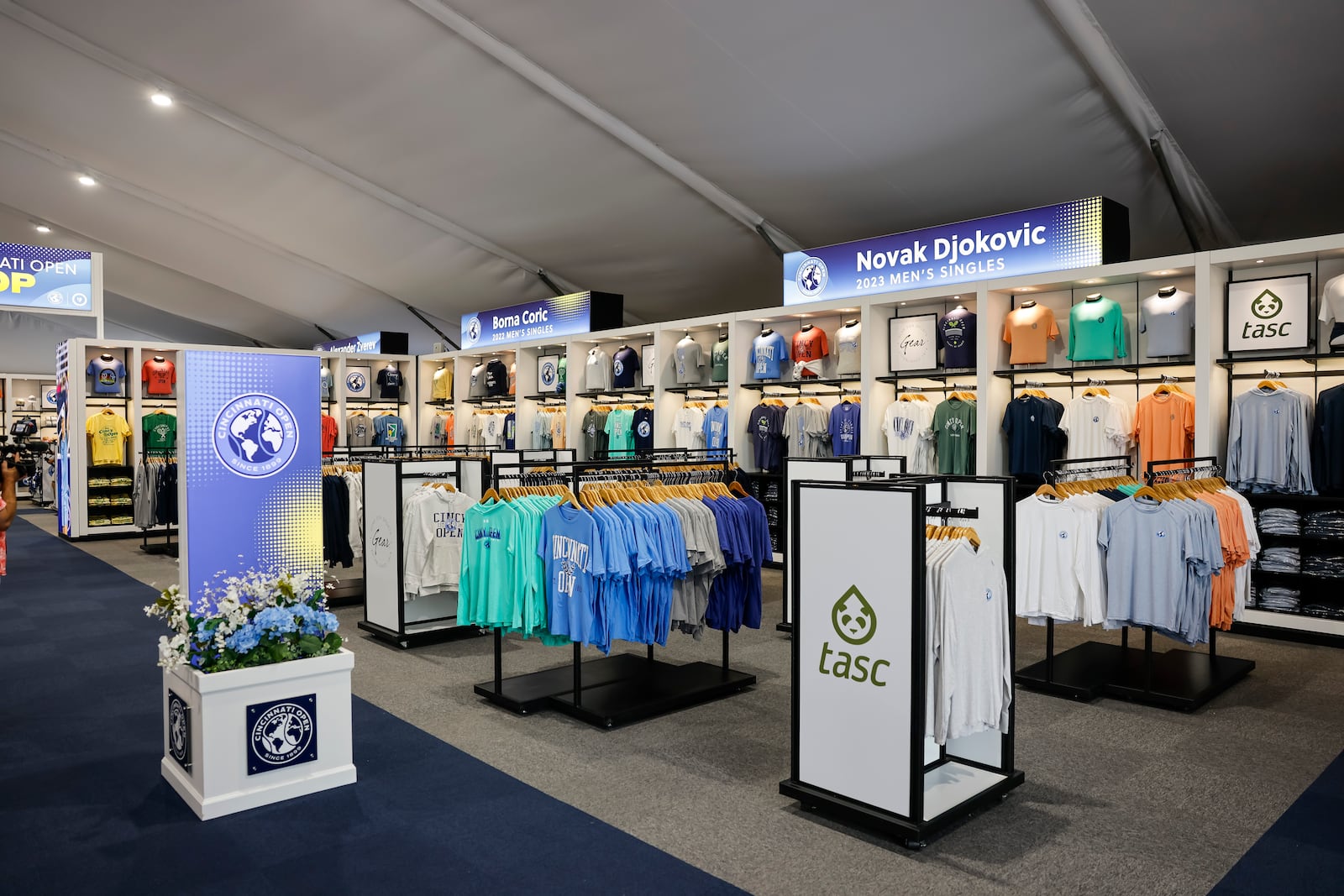 The Lindner Family Tennis Center in Mason, home of the Cincinnati Open, has undergone a $260 million renovation to double the size of the campus to 40 acres, increase amenities for fans and players, add 10 new sunken practice courts with better views for fans and more. This is the new tournament shop. NICK GRAHAM/STAFF 