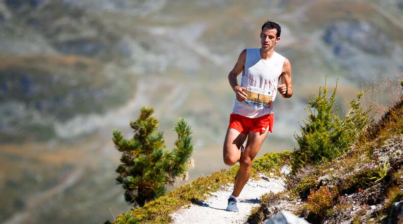 FILE - Kilian Jornet of Spain runs to win the 45th Sierre-Zinal long distance mountain race in Saint-Luc, Switzerland, Sunday, Aug. 12, 2018. (Valentin Flauraud/Keystone via AP,File)