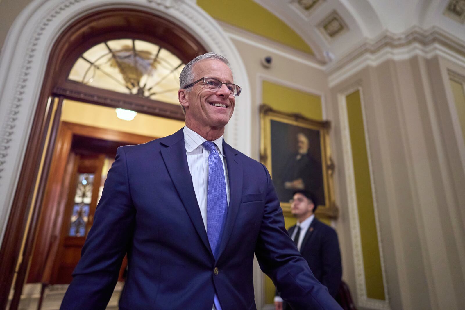 Senate Majority Leader John Thune, R-S.D., leaves the chamber Wednesday afternoon with plans to take up voting on the GOP's sweeping mega bill by next week despite lack of support from key fiscal hawks, at the Capitol in Washington, Wednesday, June 18, 2025. (AP Photo/J. Scott Applewhite)