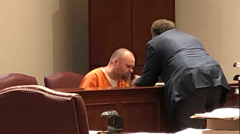 Christopher A. Edwards, 38, talks to lawyer Elliot Bastian before a hearing Tuesday in Warren County Court.HANDOUT