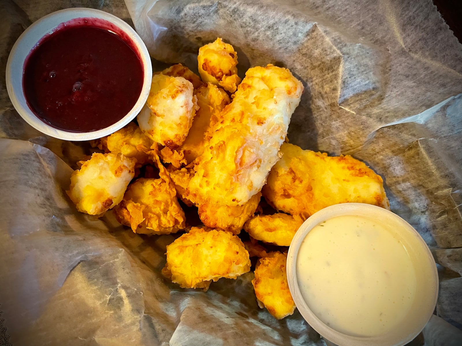 Fifth Street Brewpub is located at 1600 E. Fifth St. in Dayton's St. Anne's Hill neighborhood. Pictured are Blue Jacket Cheese Curds served with house made ranch and mixed berry preserves. NATALIE JONES/STAFF