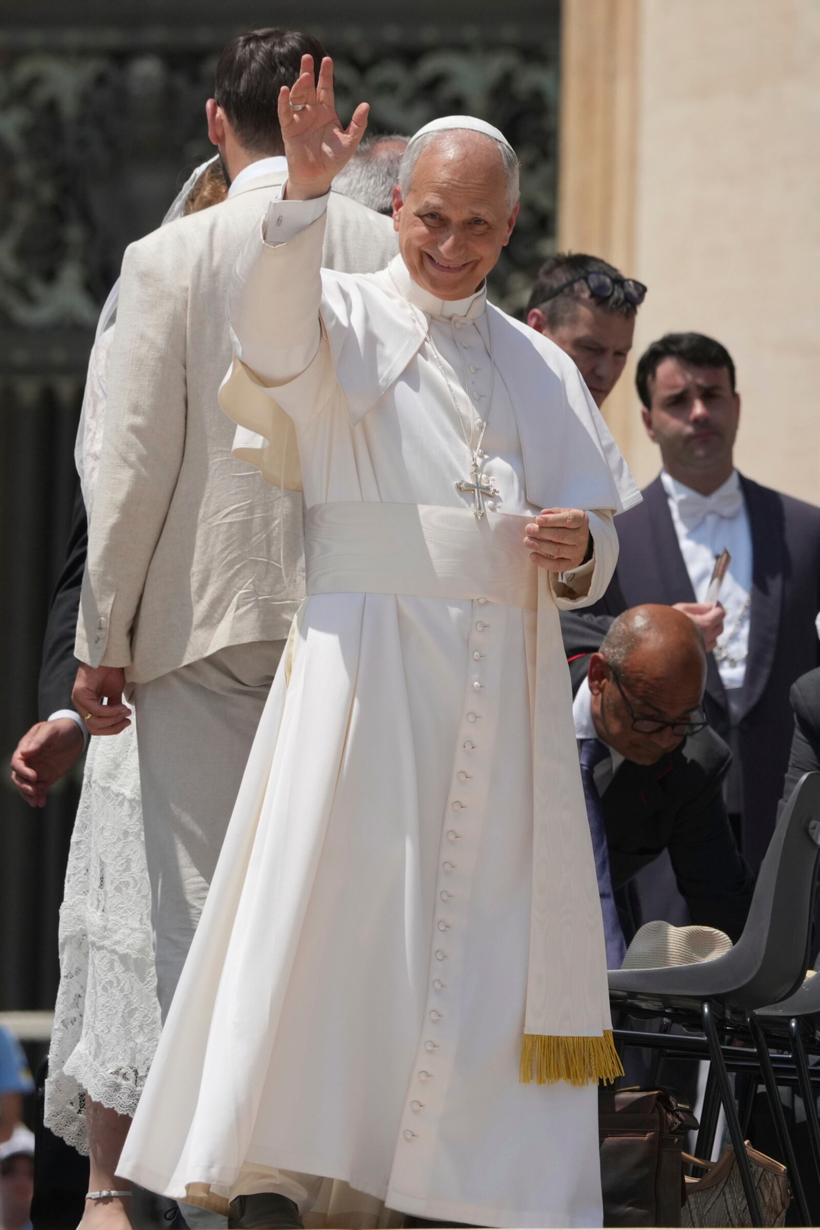 Pope Leo XIV waves at the end of his weekly general audience in St. Peter's Square at The Vatican, Wednesday, June 11, 2025. (AP Photo/Andrew Medichini)