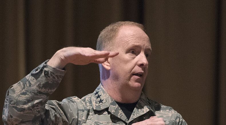 Lt. Gen. Robert D. McMurry, Air Force Life Cycle Management Center commander, talks to his Airmen Jan. 19 during a commander’s call in the Wright-Patterson Air Force Base, Ohio, Theater. The commander highlighted five areas or lines of efforts as well as activities aligned with each area that will improve AFLCMC’s efficiency and help the center meet his vision. (U.S. Air Force photo/R.J. Oriez)