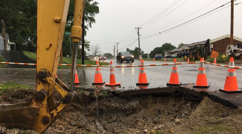 Starting after July 4, a portion of Dayton-Xenia Road will be closed for 10 days to accommodate the installation of a culvert near Woods Drive in Beavercreek. A larger project will affect the road for about a year. RICH WILSON/STAFF