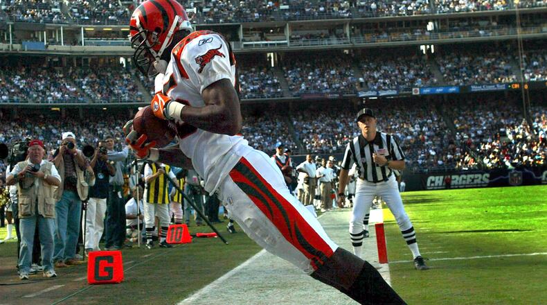 SAN DIEGO - NOVEMBER 23, 2003: Chad Johnson #85 of the Cincinnatti Bengals gets his toes in the end zone to score a touchdown against the San Diego Chargers in the first-half NFL action November 23, 2003 at Qualcomm Stadium in San Diego, California. (Photo by Donald Miralle/Getty Images)