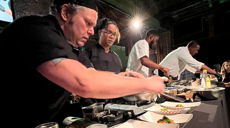 The final round of the Diced in Dayton Chef's Challenge saw the team from Corner Kitchen led by executive chef Gavin St. Denis (far left), face off agains the team from Rich Taste Catering led by chef and owner Gerald Richardson (far right).