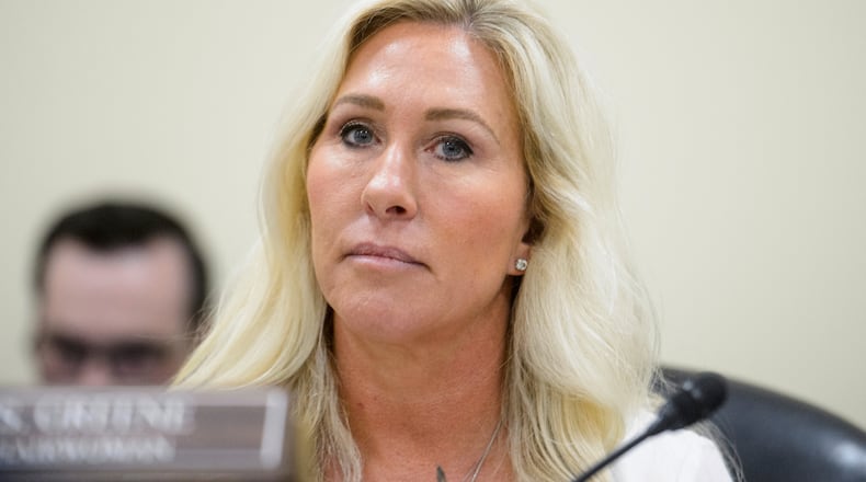 FILE - Rep. Marjorie Taylor-Greene, R-Ga., presides over a House Committee hearing on Capitol Hill, Feb. 12, 2025, in Washington. (AP Photo/Rod Lamkey, Jr., File)