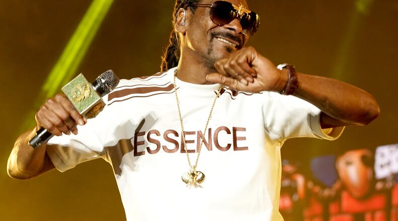 NEW ORLEANS, LA - JULY 06:  Snoop Dogg performs onstage during the 2018 Essence Festival presented By Coca-Cola - Day 1 at Louisiana Superdome on July 6, 2018 in New Orleans, Louisiana. Snoop Dogg had been scheduled to perform at the 2021 Cincinnati Music Festival, but the festival has been postponed to 2022. (Photo by Bennett Raglin/Getty Images for Essence)