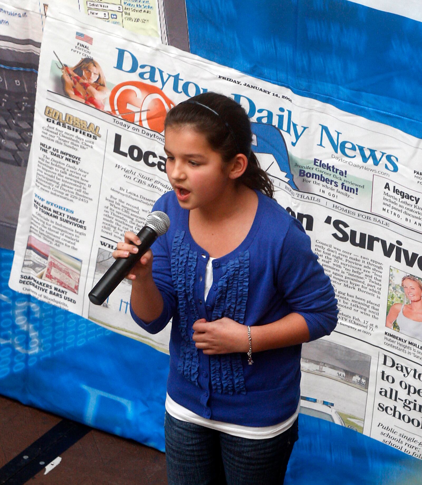 Abby Cates of Centerville sings the Star Spangled Banner during the Dayton Dragons National Anthem Tryouts on March 5, 2011, at the Dayton Mall. "I really like to sing," Abby said. "And I really want to sing the National Anthem at the ball game." DAYTON DAILY NEWS ARCHIVE PHOTO