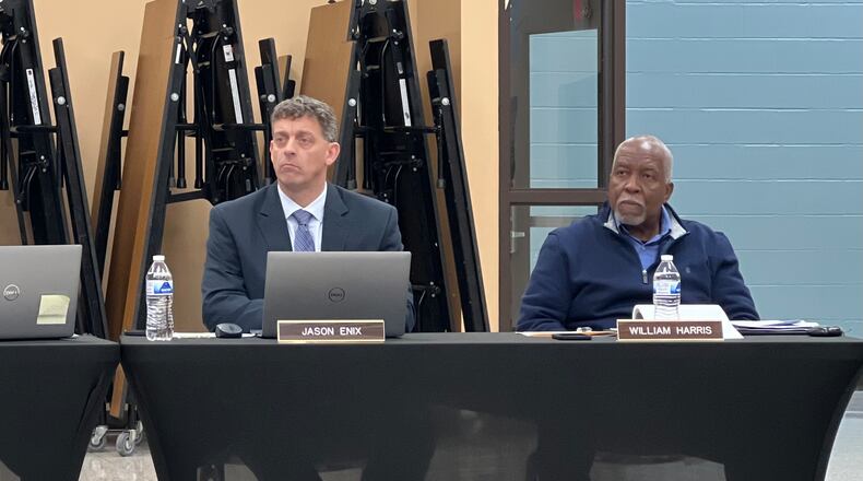 Huber Heights City School District Superintendent Jason Enix and school board member William Harris. AIMEE HANCOCK/STAFF