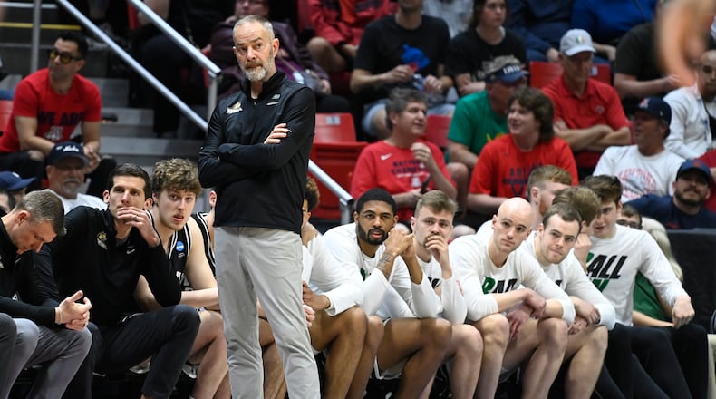 Wright State head coach Scott Nagy stands with his team at the bench during the second half of a first-round NCAA college basketball tournament game against Arizona, Friday, March 18, 2022, in San Diego. Arizona won 87-70. (AP Photo/Denis Poroy)